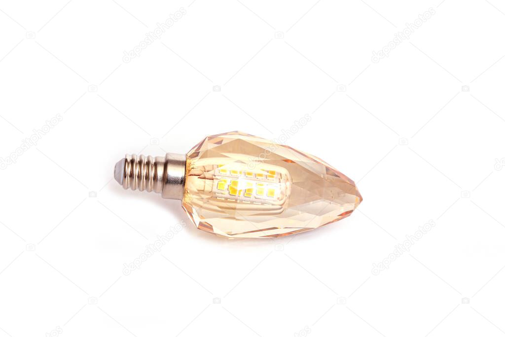 Crystal energy saving LED light bulb isolated on white background.