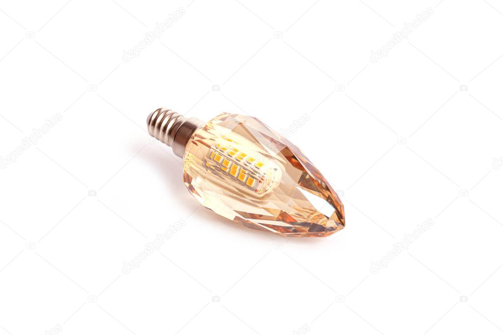 Crystal energy saving LED light bulb isolated on white background.