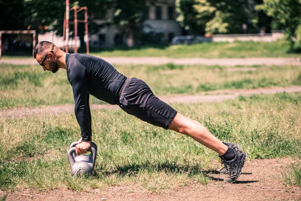 Athletic Man Working Out Kettlebell Street Gym Yard Strength Motivation — Stock Photo, Image