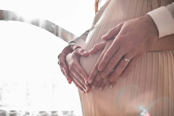 Pregnant Woman Her Husband Holding Hand Heart Shape Baby Bump — Stock Photo, Image