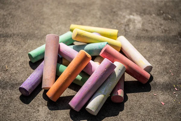 Pieces Of Colored Chalk And White Chalk Stock Photo, Picture and Royalty  Free Image. Image 94042116.