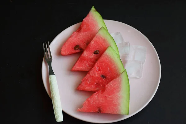 Slices Ripe Watermelon Light Plate Dark Background — Stock Photo, Image