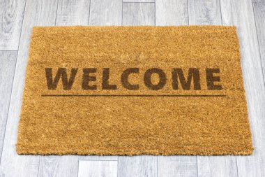 Gri vinil döşemede hoş geldin paspası