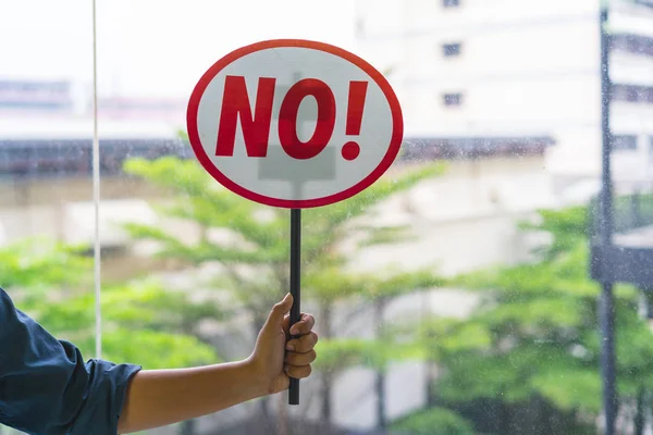 person are holding signs 