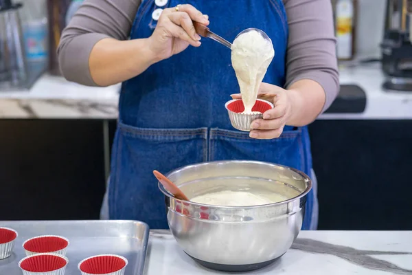 woman making cake in the room