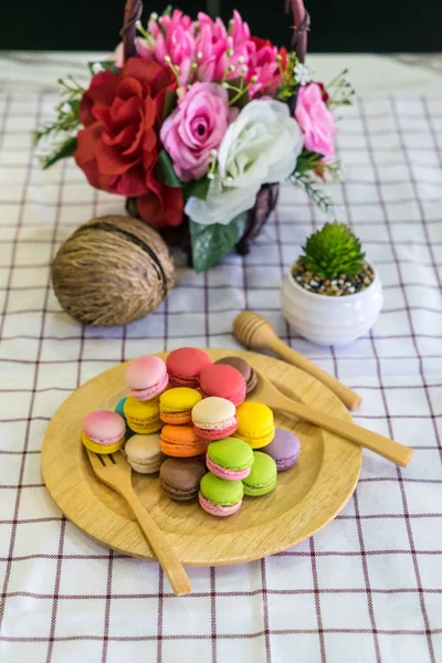 Stack of macaron dessert  on woodent plate — Stock Photo, Image