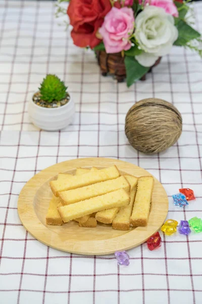 Crispy Bread Butter Sugar on wooden plate — Stock Photo, Image