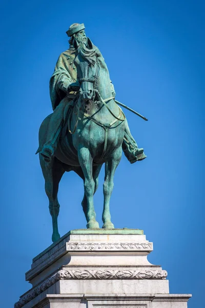 statue in a park in the city of milan in Italy