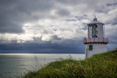 İrlanda 'nın Antrim ilçesinde Whitehead yakınlarında Blackhead Deniz Feneri