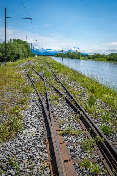 train lines at the river Rhein at Hard, Vorarlberg, Austria