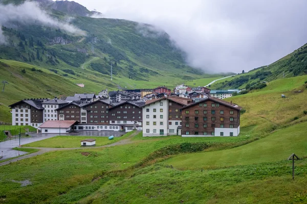 Holiday in summer and winter in the small village Zuers in the Alps, Vorarlberg, Austria
