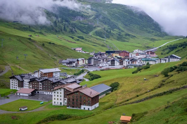 Holiday in summer and winter in the small village Zuers in the Alps, Vorarlberg, Austria