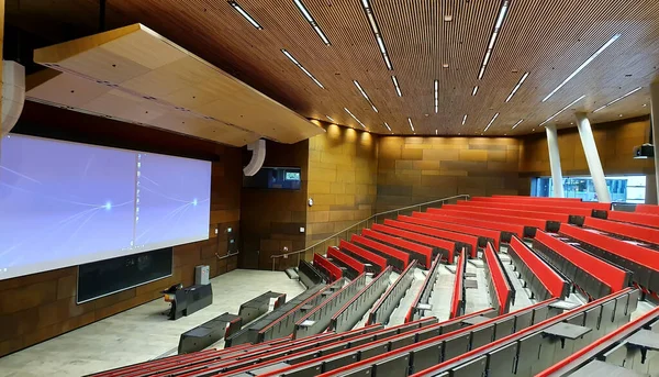 Empty modern university auditorium. The university auditorium is ready to receive students. Higher education concept. Online education. Distance education