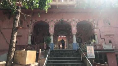 Jaipur, India - November 04, 2019: Hawa Mahal tourist walks through the arch part 2