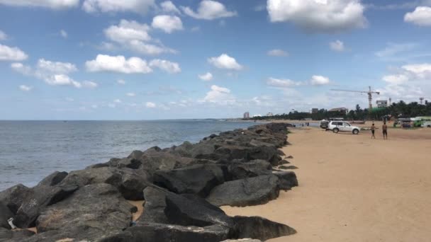 Negombo, Sri Lanka, November 23, 2019, tourists walk along the shore — 비디오