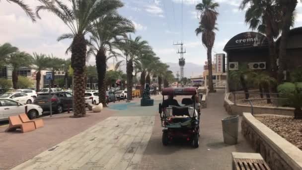 Eilat, Israel - transport moves through the streets of the resort town part 6 — Stockvideo