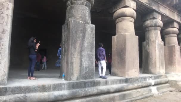 Mumbai, India - November 10, 2019: Elephanta Caves tourists in the cave part 4 — 비디오