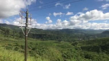 Ella, Sri Lanka, electric poles against the backdrop of green terrain