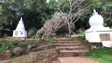 Mihintale, Sri Lanka, small white material buildings