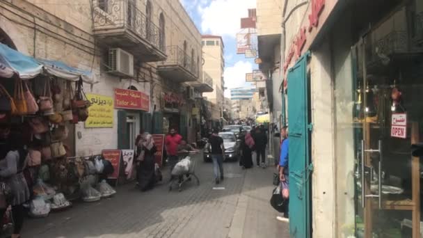 Bethlehem, Palestine - October 20, 2019: tourists walk the streets of the city part 13 — стокове відео