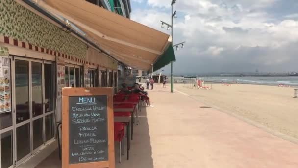 La-Pineda, Spain, A chair sitting in front of a building — Stock Video