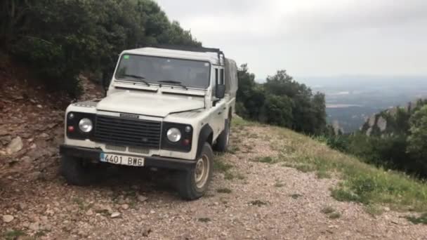 Montserrat, Spain, A truck driving down a dirt road — Stock Video