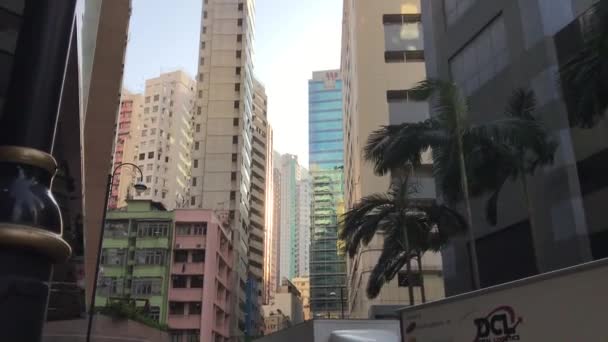 ฮ่องกง จีน ป้ายบนด้านข้างของตึก — วีดีโอสต็อก