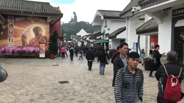 홍콩, 중국, 2016 년 11 월 20 일: 건물 앞에서 있는 일단의 사람들 — 비디오