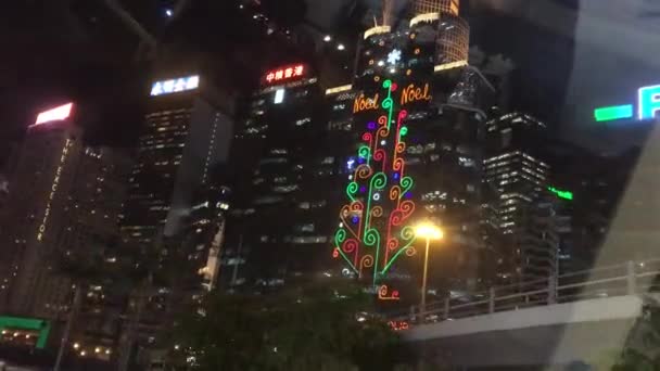 Hong Kong, Chine, Une ville éclairée la nuit — Video