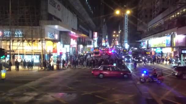 Hong Kong, China, A group of people walking on a city street — Stock Video