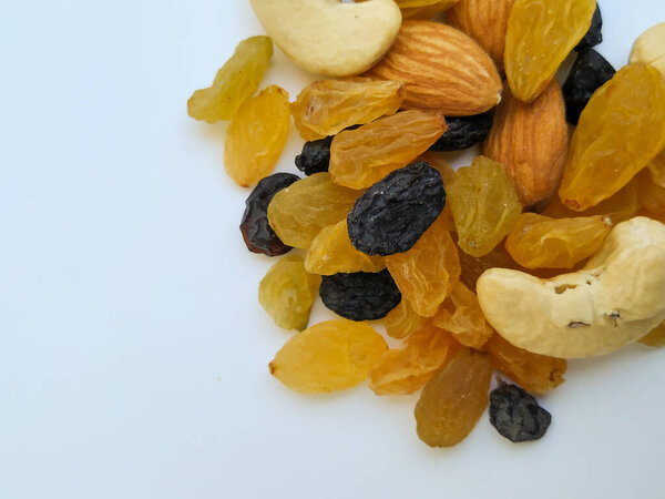 Dry Fruits and Nuts Pile isolated in a white background