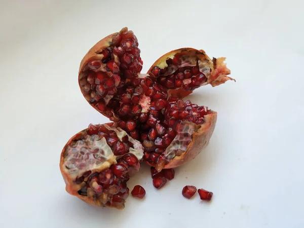 Closeup Pomegranate Fruit Sliced Four Section Isolated White Background — Stock Photo, Image