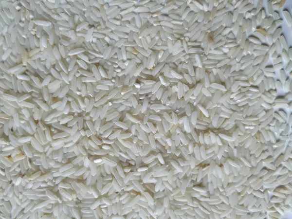 Closeup White Rice Heap Cozinha Isolada Fundo Branco — Fotografia de Stock