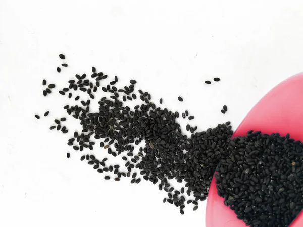 Closeup Chia Seeds Kama Kasturi Seed Scattered Red Color Plastic — Stock Photo, Image