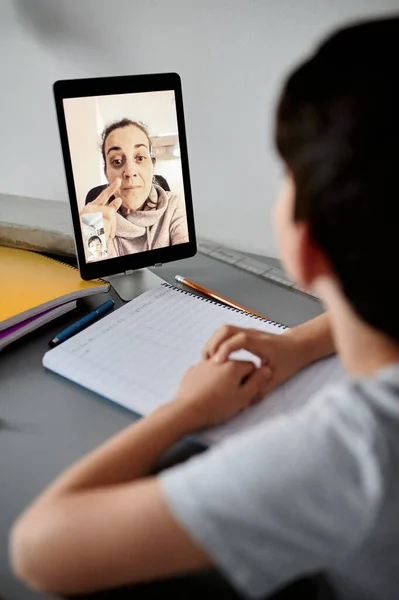 Happy little boy attending online classes from home. School education and social distance during quarantine — Stock Photo, Image
