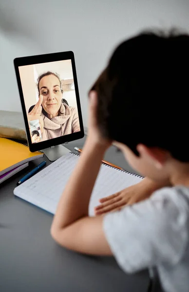 Happy little boy attending online classes from home. School education and social distance during quarantine — Stock Photo, Image