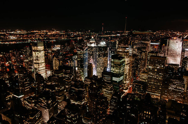 Manhattan aerial night view in the nigh from the empire state