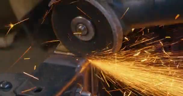 Hand Held Metal Surface Angle Grinder Making Sparks — Stock Video