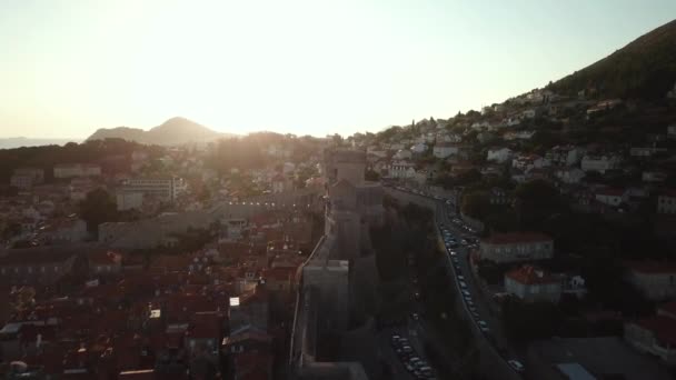 Dubrovnic Old City Walls and Fortress, Croatia. Aerial View on Sunset Sunlight — Stock Video