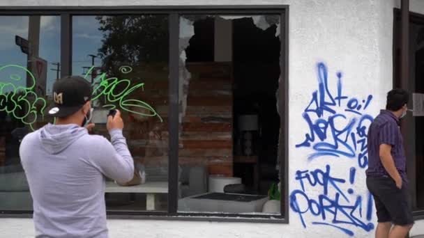 Broken Window of Furniture Store, Black Lives Matter Protest in Los Angeles USA — Stockvideo