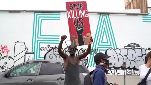 Black Male with Mask and Stop Killing Us Sign, LA Black Lives Matter Protest — Stock video