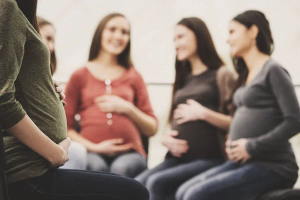 Close up.Pregnant girl holds onto stomach. Pregnant girls — Stock Photo, Image