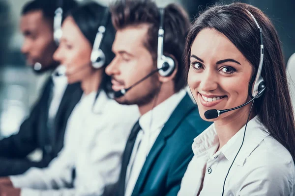 Multicultural young happy employees in call center — Stock Photo, Image