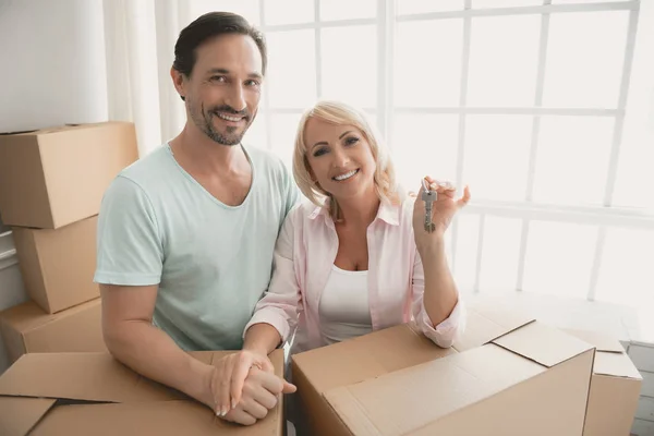 Happy Married Couple Stand by Window of Apartment. — Stock Photo, Image