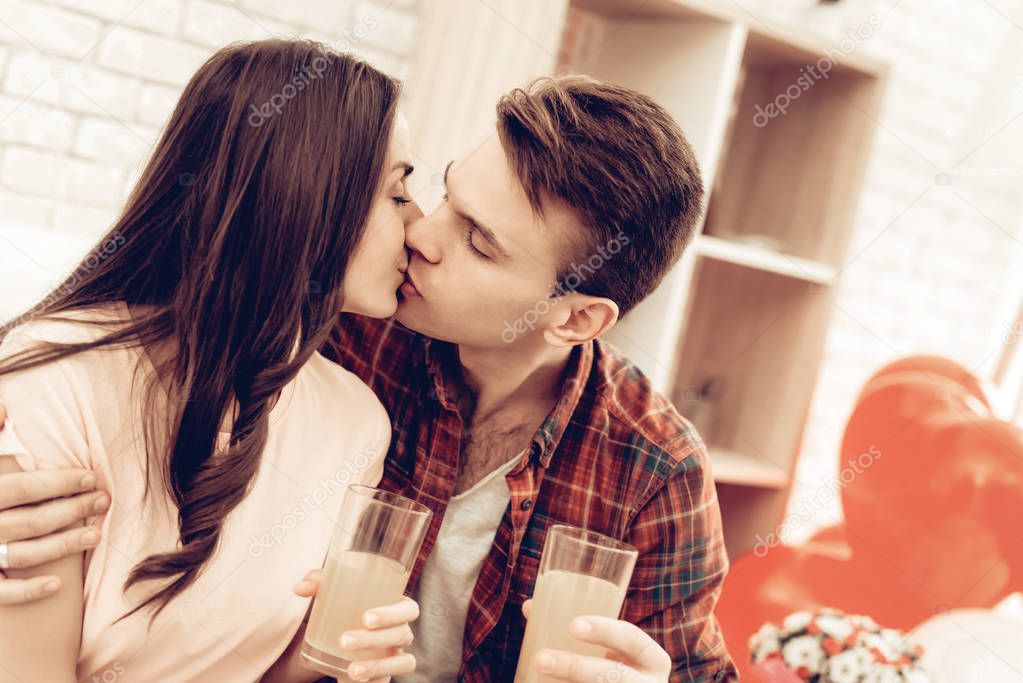 A Guy And A Girl Romantic Kiss On Saint Valentine's Day. Love Each Other. Sweet Holiday. Sweetheart's Celebration Concept. Young And Handsome. Happy Relationship. Feelings Showing.