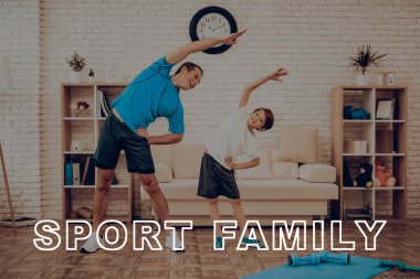 Baba ve oğul spor salonu yapıyoruz. Spor aile. Sağlıklı bir yaşam tarzı. Aktif tatil. Giysi uygular. İyiye gidiyor. Evde çalışma dışarı. Spor salonu halı. Uygulama tekrar. Vücut biçimlendirme.