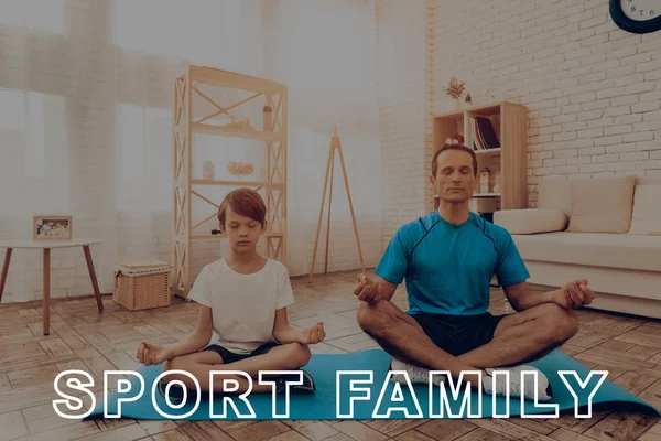 Father And Son Are Doing Gym. Sport Family. Healthy Lifestyle. Active Holiday. Exercises Clothes. Getting Better. Working Out At Home. Gym Carpet. Repeating Practice. Yoga Shaping.