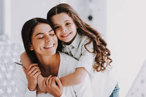 Young Mother Smiling Little Daughter Hugging Happy Adorable Little Girl — Stock Photo, Image