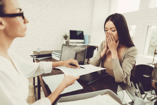 Young Upset Woman in Office with Lawyer in Glasses. Frustrated Woman. Problem in Relationship between People. Modern Law Office. Angry Young Woman. Marriage Problem. Young Advocate.