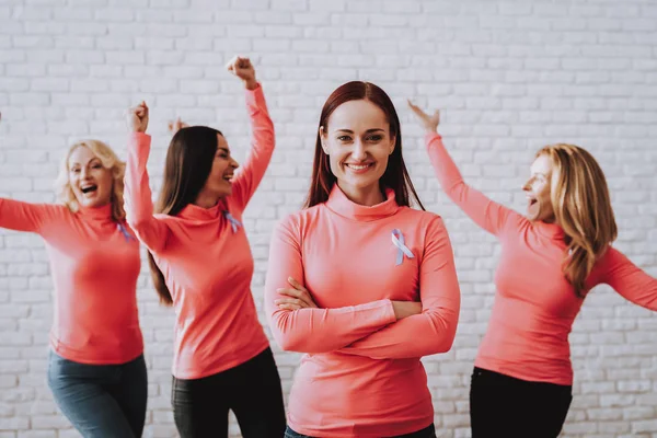 Style Girl Smile in Studio. Lady Help People with Cancer. Happy Girl Happy Support. Smile this Support. Strong Girl Help People. Model in Studio. Beauty Girl in Pink Blouse. Model with Support Style .